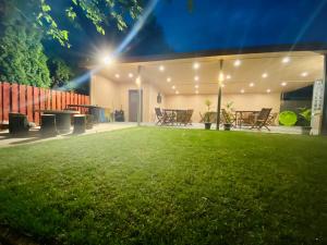 Zahrada ubytování Linton Apartmanház