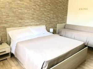 Postel nebo postele na pokoji v ubytování Messapia Casa Vacanze