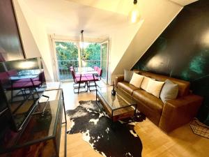 Кът за сядане в Boutique Apartment Petite Belle