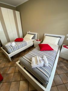 A bed or beds in a room at B&B Ares Castel Baronia