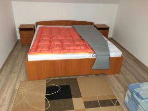 Postel nebo postele na pokoji v ubytování Szentmiklós Vendégház