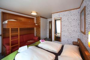 Postel nebo postele na pokoji v ubytování Haus Alpenliebe