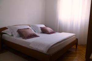 מיטה או מיטות בחדר ב-Apartment Tereza