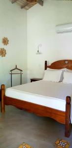 Postel nebo postele na pokoji v ubytování Pousada Villages Boutique Hotel - 150m da Praia da Laje