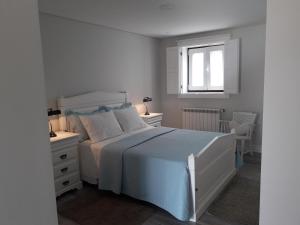 Postel nebo postele na pokoji v ubytování Casa d'Artengo