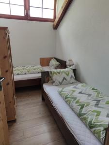 A bed or beds in a room at Goserhof