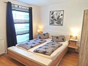 Letto o letti in una camera di Schusterbauer