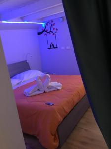 Ліжко або ліжка в номері New Arcobaleno Ossegna