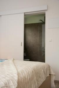 Letto o letti in una camera di Helis Gästezimmer