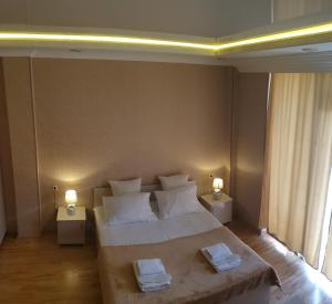 Postel nebo postele na pokoji v ubytování Hotel BellMar