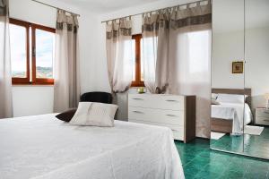 Hotel Sa Lumenera tesisinde bir odada yatak veya yataklar