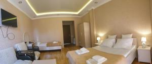 Postel nebo postele na pokoji v ubytování Hotel BellMar