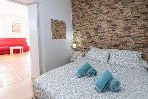 Posteľ alebo postele v izbe v ubytovaní Apartment La Gitanilla terrace
