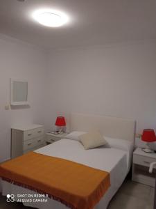 Cama o camas de una habitación en Hostal Casablanca