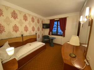Krevet ili kreveti u jedinici u okviru objekta Hotel Kaiser Franz Josef