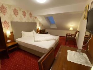 Krevet ili kreveti u jedinici u okviru objekta Hotel Kaiser Franz Josef