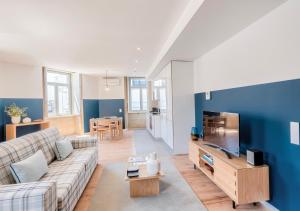 A seating area at Mouzinho da Silveira Unique Apartments, by Oporto Collection