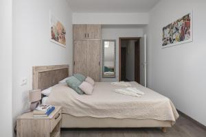 Posteľ alebo postele v izbe v ubytovaní Sky Airport Apartments