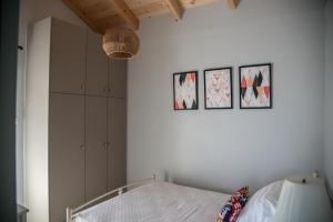 Rena's Panorama View House tesisinde bir odada yatak veya yataklar