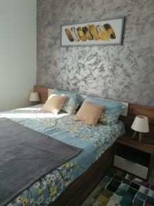 Oslo Sunset Apartment tesisinde bir odada yatak veya yataklar