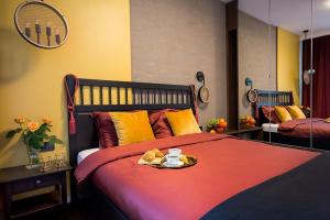 Un pat sau paturi într-o cameră la W&K Apartments - Desire Suite