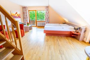 Postel nebo postele na pokoji v ubytování Wohlfühlhotel Sonnengarten