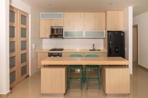 Dapur atau dapur kecil di Magico Apartamento Frente al Mar 3 Habitaciones AR51