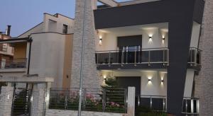 a building with balconies on the side of it at B&B La Rosa dei Venti in Altamura