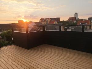 Východ nebo západ slunce při pohledu z apartmánu nebo okolí