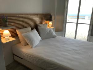 Postel nebo postele na pokoji v ubytování The Aegean Horizon Villa
