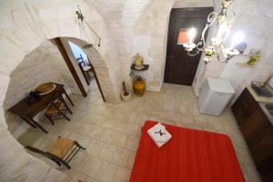 A bed or beds in a room at Antica Aia B&B