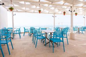 A restaurant or other place to eat at Hotel Magna Grecia