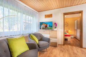Area soggiorno di Pension Am Weinberg Sächsische Schweiz