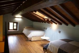 Llit o llits en una habitació de Tramonto Casa Barga Toscana ristrutturata 2021