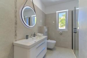Kúpeľňa v ubytovaní APARTMANI OLIMP