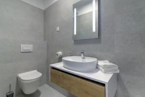 Kúpeľňa v ubytovaní APARTMANI OLIMP