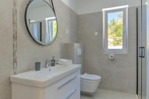 Kúpeľňa v ubytovaní APARTMANI OLIMP
