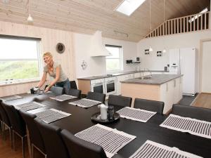Kuchyň nebo kuchyňský kout v ubytování 16 person holiday home in Løkken-By Traum