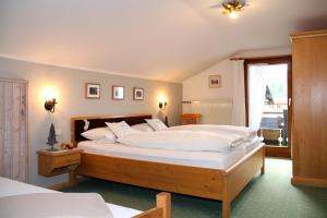 Кровать или кровати в номере Haus Vogler