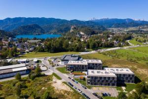 an aerial view of a school campus with a lake at Diamond Bled in Bled