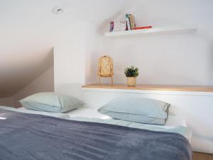 Ένα ή περισσότερα κρεβάτια σε δωμάτιο στο Apartmán Čtrnáct