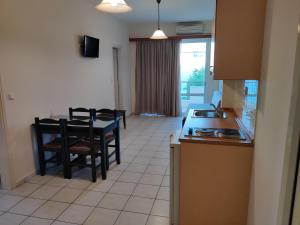 A kitchen or kitchenette at Zannis Hotel