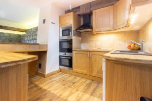 Η κουζίνα ή μικρή κουζίνα στο Chalet Boubou Plus by Chalet Chardons