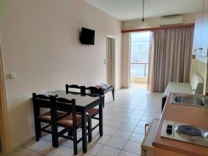 A kitchen or kitchenette at Zannis Hotel