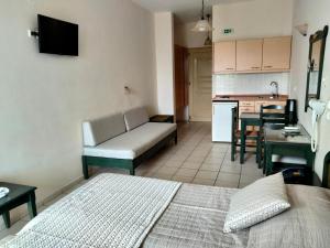 A kitchen or kitchenette at Zannis Hotel