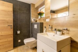 Koupelna v ubytování Villa Gloria Rooms & Apartments + 37 fotografií