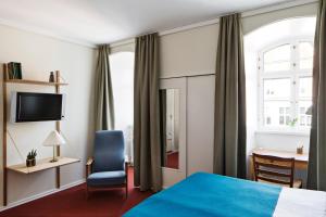 Postel nebo postele na pokoji v ubytování Hotel Alexandra