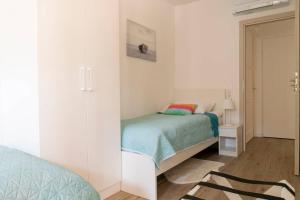 Postel nebo postele na pokoji v ubytování Apartment in Casa Porta Luna, Gajac, Novalja