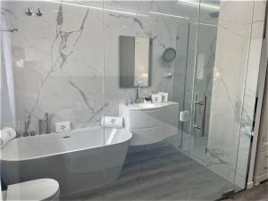 Ванная комната в Hotel Malaga Picasso