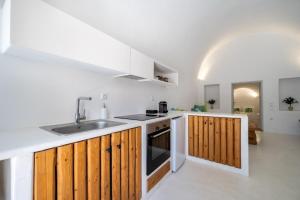 Kjøkken eller kjøkkenkrok på Fertimo Suites